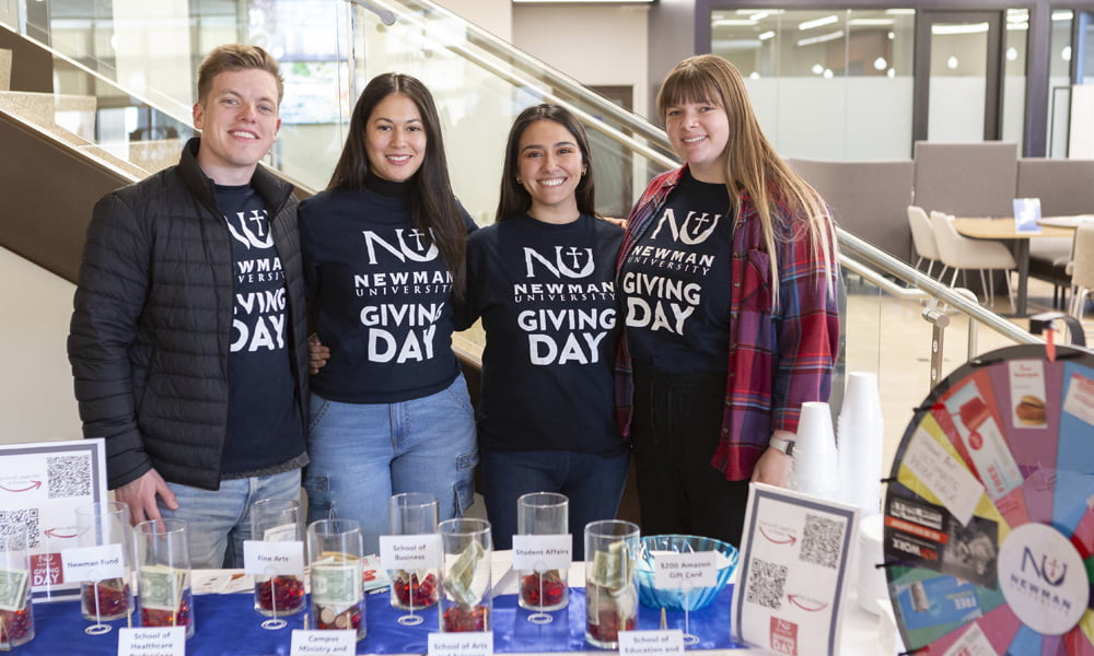 Staff members wearing Giving Day t-shirts